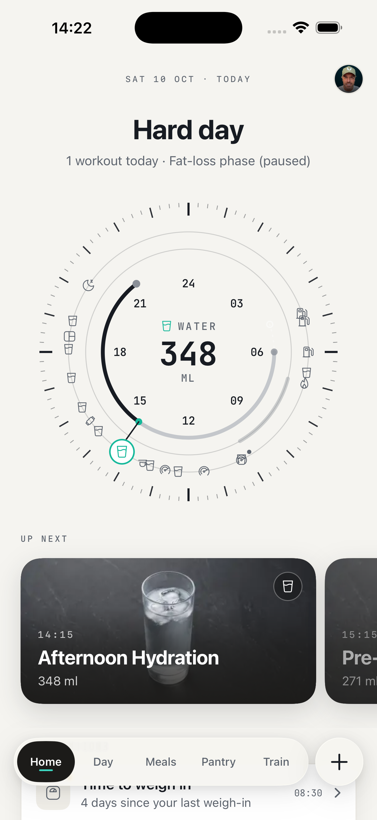 The KEXBI home screen: the day planned on one clock, with the next meal up next