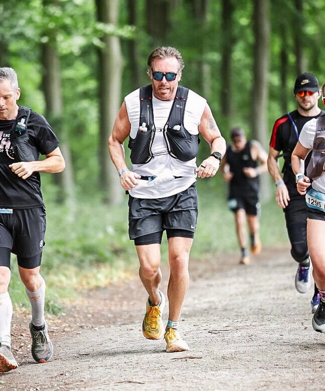 Ben, KEXBI founder, running a trail race
